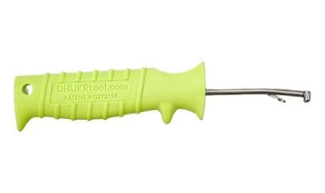 Green-handled screwdriver with metal shaft.