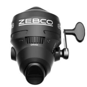 Black Zebco fishing reel with ergonomic handle and spool.