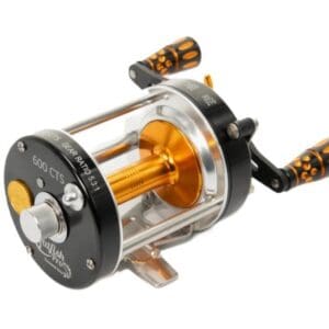A gold and black fishing reel with a transparent body.