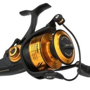 Close-up of a black and orange fishing reel with detailed components.