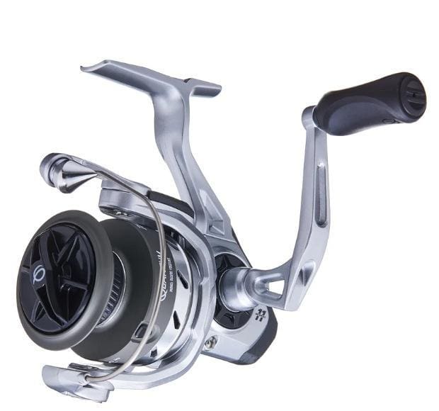 Close-up of a silver fishing reel with black spool and ergonomic handle.
