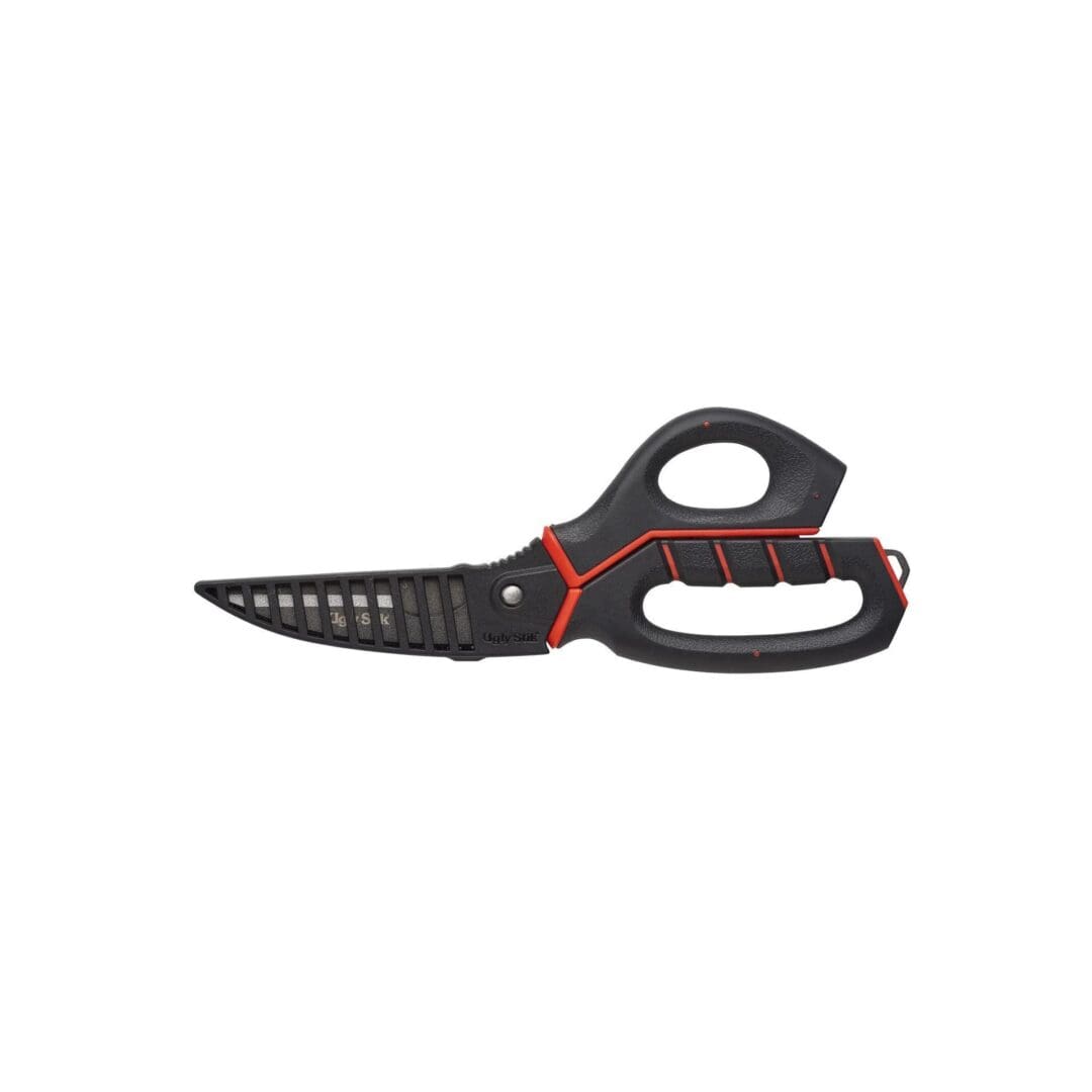 Black and red kitchen scissors with serrated blades.