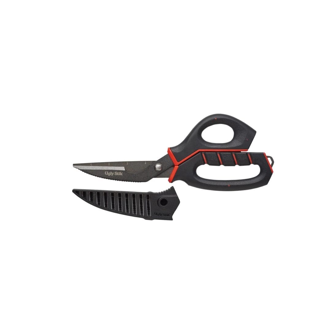 Black and red kitchen scissors with a protective cover.
