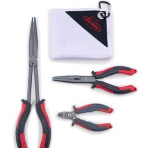 A set of three pliers with black and red handles and a white cloth.
