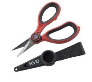 Compact red and black scissors with a protective sheath.