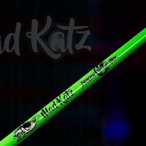 Bright green drumstick with branding against dark background.