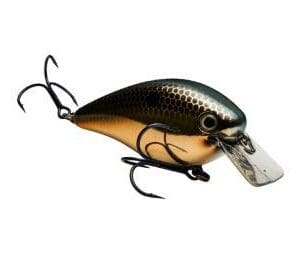 A black and gold fishing lure with two treble hooks.