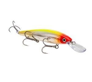 A detailed fishing lure with treble hooks and a red head.
